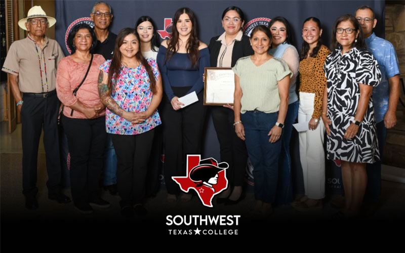 Moreno family poses with scholarship recipients.